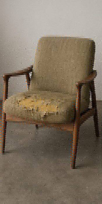 Worn armchair before